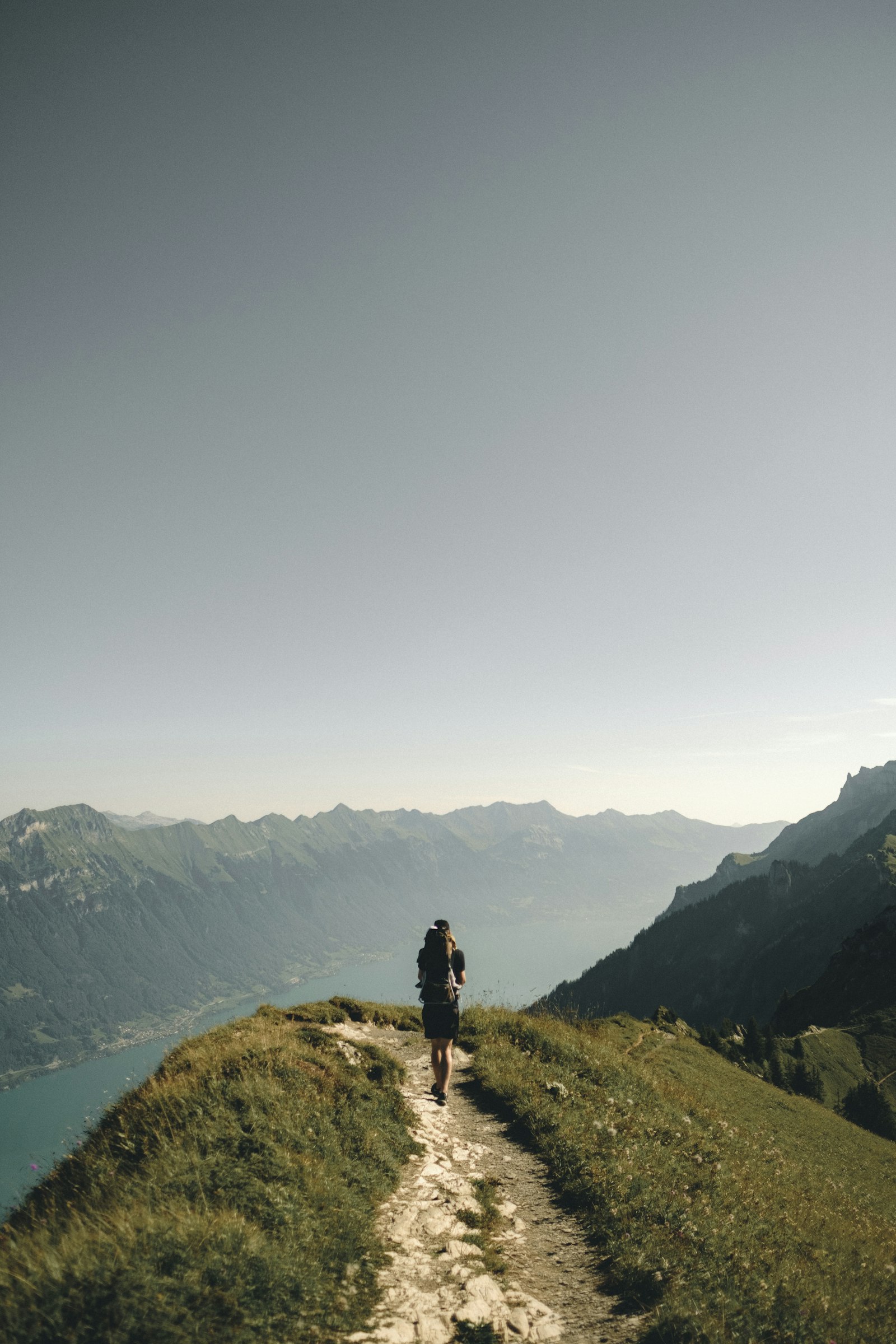 Hiker looking over a mountain valley